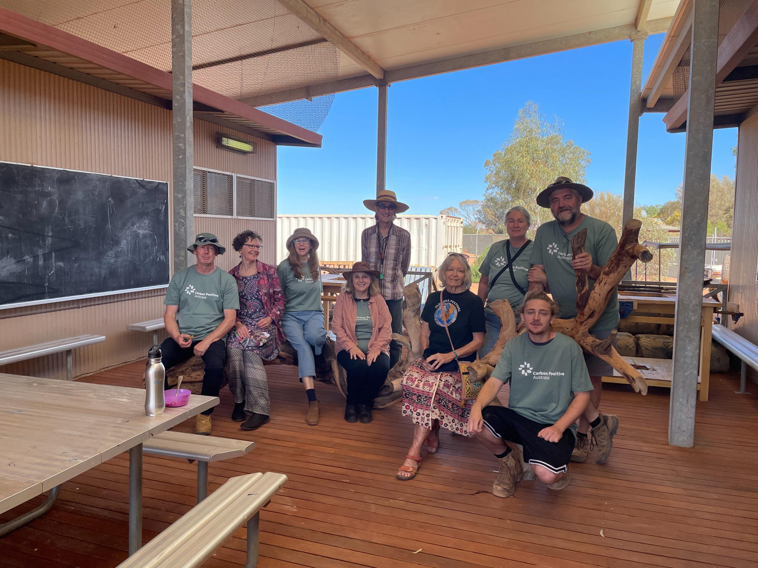 Group photo under a patio