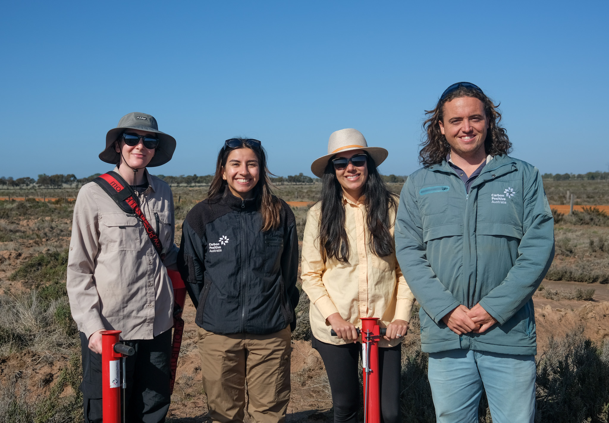 2507_211 Brookton Saltland Photo 1.JPG The team standing in front of the planting rows.